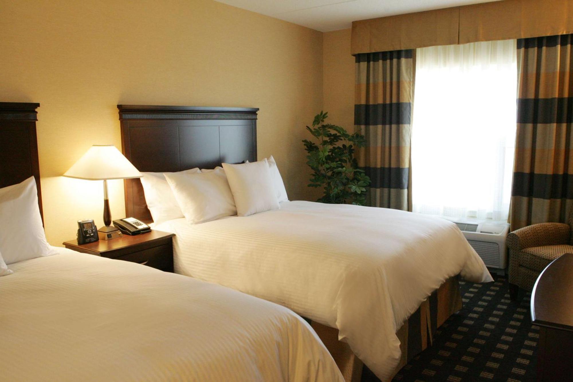 Two Bedroom Suite with One King and Two Queen Beds - Non-Smoking